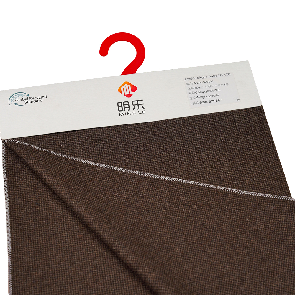 60 % uld, 30 % polyester, 10 % andre fibre, 300 g/m, blandet kaffe + rød bønnepasta hirse, flannelstof, ML-S06-050